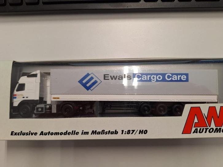 1:87 Ewals Cargo Care Volvo FH16 420 AWM, Hobby en Vrije tijd, Modelauto's | 1:87, Gebruikt, Bus of Vrachtwagen, AWM, Ophalen of Verzenden