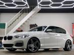 BMW 1-Serie (f20) M140i 340pk Aut 2017 Wit, Auto's, BMW, Origineel Nederlands, Te koop, 5 stoelen, 14 km/l