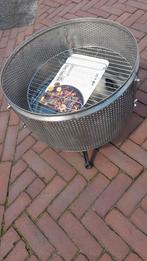 Barbecue gemaakt van RVS wasmachine trommel. In hoogte verst, Ophalen