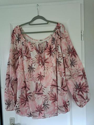 Leuke Stretch Blouse,kan ook off shoulder gedragen worden.  beschikbaar voor biedingen