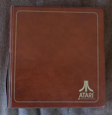 Atari map met 8 Atari 2600 cartridges beschikbaar voor biedingen