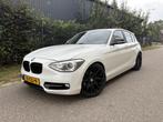 BMW 1-serie 118i Business+ / AUTOMAAT / LEER / NAVI / SCHUIF, Achterwielaandrijving, Gebruikt, 4 cilinders, 1290 kg