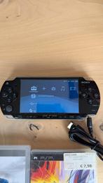 Sony psp igst met 2 spellen, Spelcomputers en Games, Spelcomputers | Sony PSP, Ophalen of Verzenden, Gebruikt, Zwart