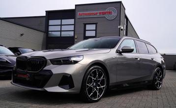 BMW i5 I5 eDrive40 M-pakket | Iconic Glow | Stoelkoeling | P beschikbaar voor biedingen
