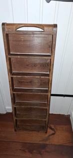 Antieke stenen mal met handvat, Ophalen