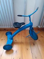 Vintage blauwe loopfiets, Ophalen