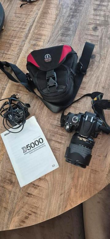 Nikon D5000 + 18-105mm lens