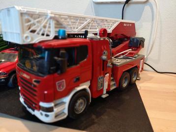 Bruder Brandweerwagen met ladder beschikbaar voor biedingen