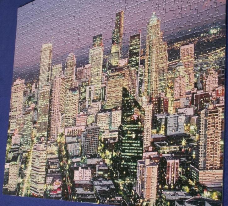 Puzzel Ravensburger starline Seattle , glow in the dark 1000, Hobby en Vrije tijd, Denksport en Puzzels, Zo goed als nieuw, 500 t/m 1500 stukjes