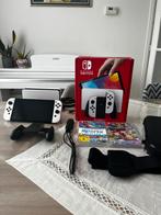 Nintendo Switch OLED met 2 games, Spelcomputers en Games, Ophalen of Verzenden, Zo goed als nieuw, Met 1 controller, Switch OLED
