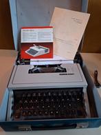 Vintage Olivetti Dora typemachine inclusief case en boekjes, Diversen, Typemachines, Ophalen, Gebruikt