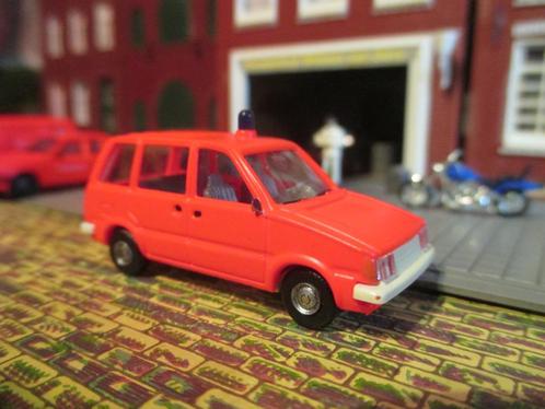 1981-1988 Nissan Prairie - Rietze Brandweer Tagesleuchtrot, Hobby en Vrije tijd, Modelauto's | 1:87, Gebruikt, Ophalen of Verzenden