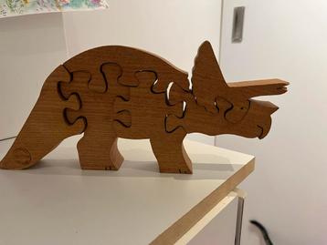 Houten Dino Puzzel beschikbaar voor biedingen