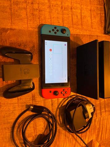 Switch compleet met docking en kabels! beschikbaar voor biedingen