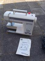 Prima functionerende Toyota 4070, Hobby en Vrije tijd, Naaimachines en Toebehoren, Ophalen of Verzenden, Gebruikt, Lockmachine