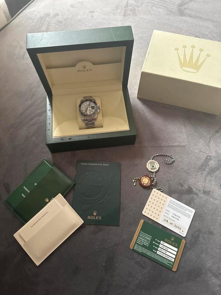 Rolex Submariner 2010 met aankoopfactuur, Sieraden, Tassen en Uiterlijk, Horloges | Antiek, Polshorloge, Overige merken, Staal