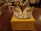2 zwanen in kristal glas, Ophalen