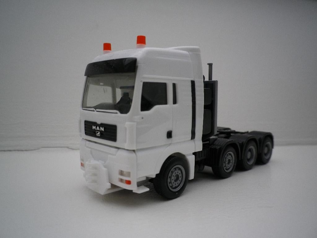 Herpa MAN TGA XXL Zwaartransport trekker. Nieuw, Ophalen of Verzenden, Nieuw, Bus of Vrachtwagen, Herpa