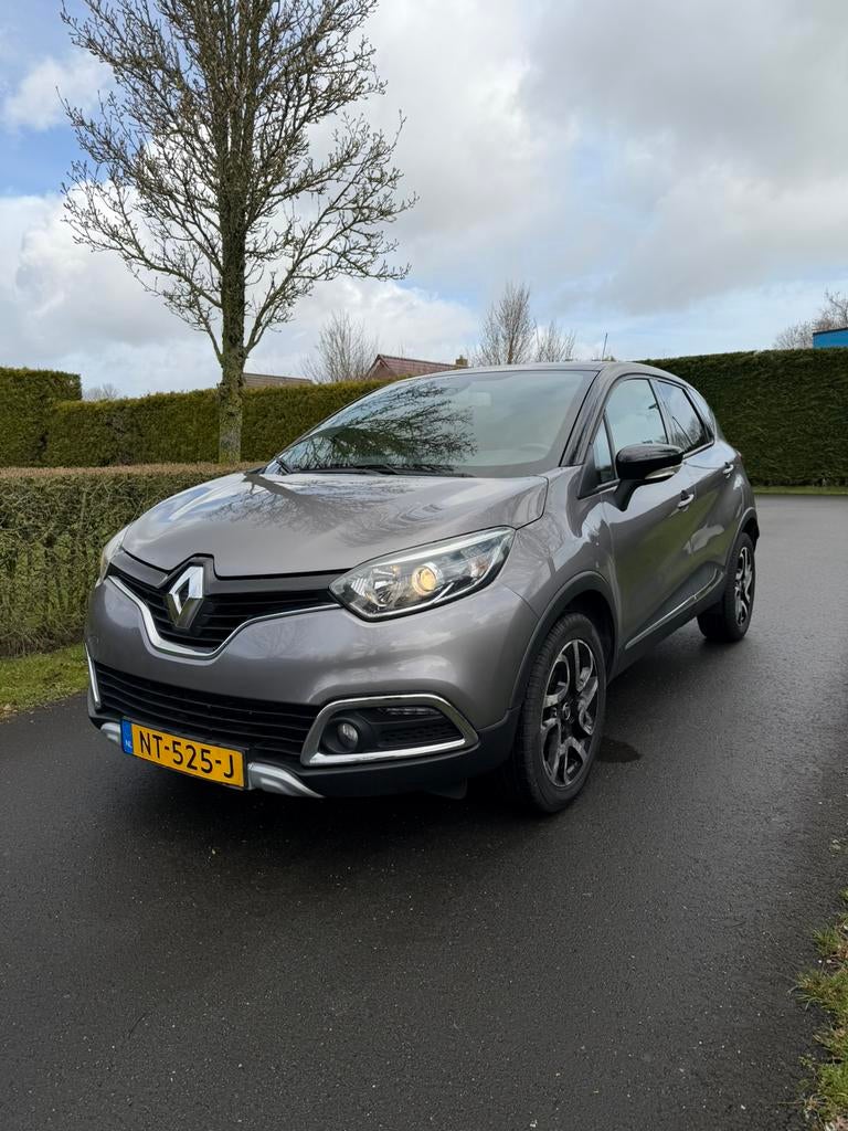 Renault Captur 1.2 TCE Airco AUT 120pk Leder 2017 Grijs, Auto's, Renault, 625 kg, Zwart, 4 cilinders, Origineel Nederlands