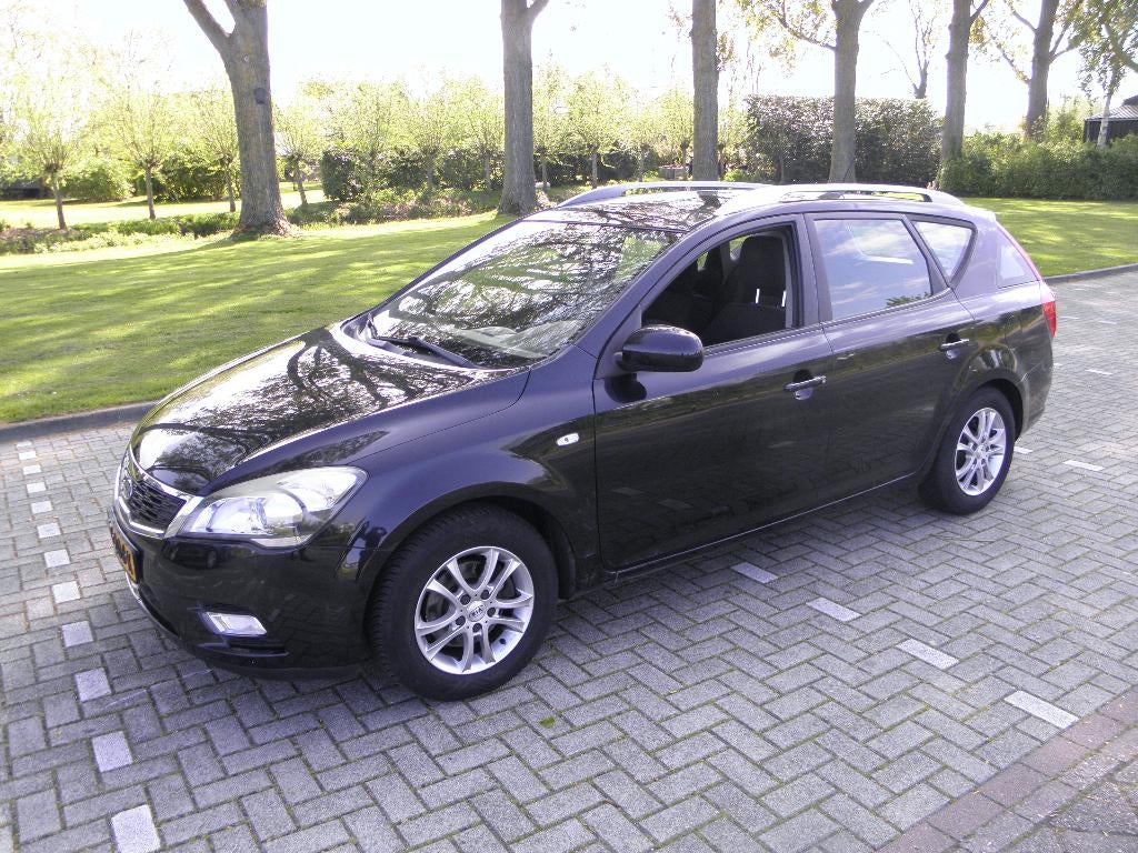 Kia (Pro) Cee d 1.4 Cvvt Sporty Wagon 2012 Zwart, Auto's, Kia, Voorwielaandrijving, 4 cilinders, 1396 cc, Zwart