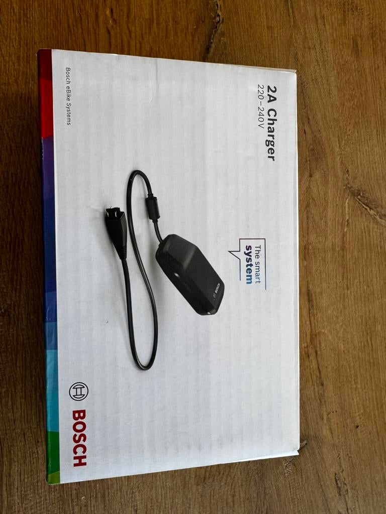 Bosch fietsaccu oplader. Nieuw, Fietsen en Brommers, Fietsaccessoires | Fietsaccu's, Ophalen of Verzenden, Nieuw