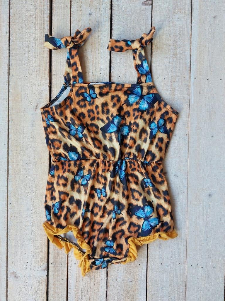 Romper met luipaardprint en blauwe vlinders 12-18 maanden, Verzenden, Zo goed als nieuw, Meisje, Broekje