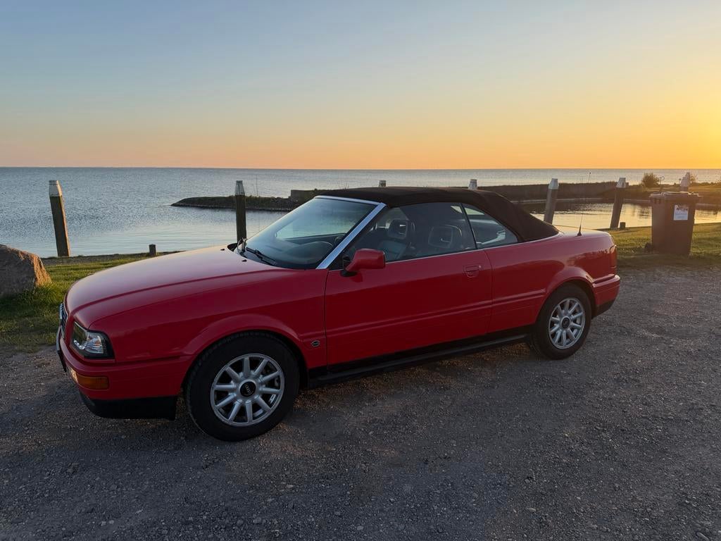 Audi Cabrio 2.3 E 98KW U9 1992 Rood, Auto's, Voorwielaandrijving, 136 pk, Zwart, 1350 kg