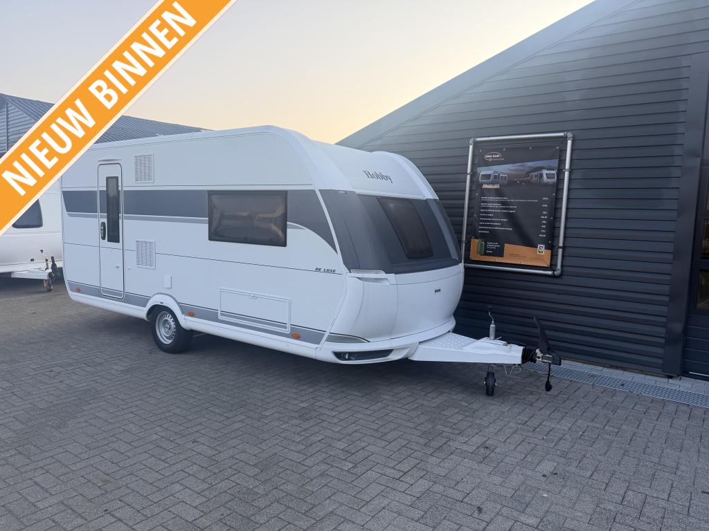 Hobby De Luxe 460 SL, 2026 enkele bedden, zw as, sfeerverlic, Caravans en Kamperen, Caravans, Schokbreker, Hobby, Bedrijf, Treinzit