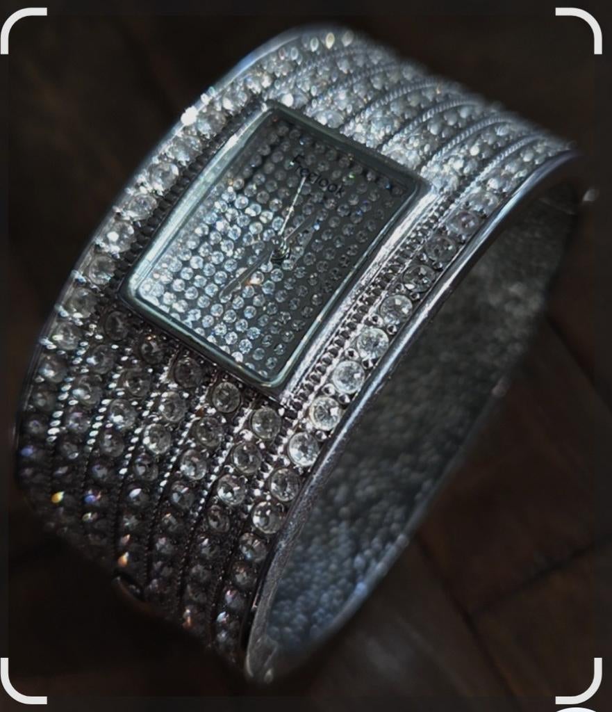 Horloge met swarovski elementen, Ophalen of Verzenden, Zo goed als nieuw, 17 tot 18, Dame