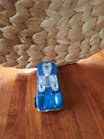 Blauwe speelgoedauto, Ophalen