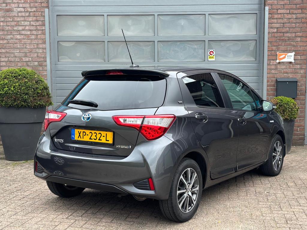 Toyota Yaris 1.5 Hybrid Y20 20 Jaren editie Automaat., Auto's, Euro 6, 4 cilinders, Lichtsensor, Origineel Nederlands