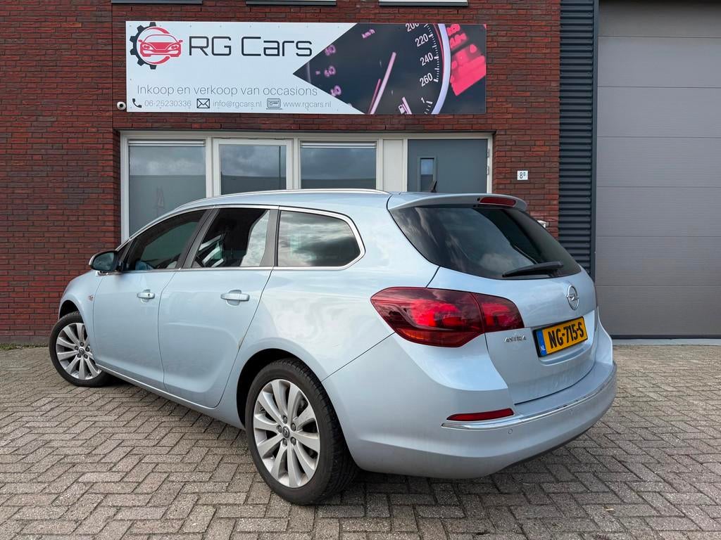 Opel Astra Sports Tourer 1.4 Business + / Leder / Navi / PDC, Auto's, Opel, Voorwielaandrijving, Gebruikt, 4 cilinders, Met garantie (alle)