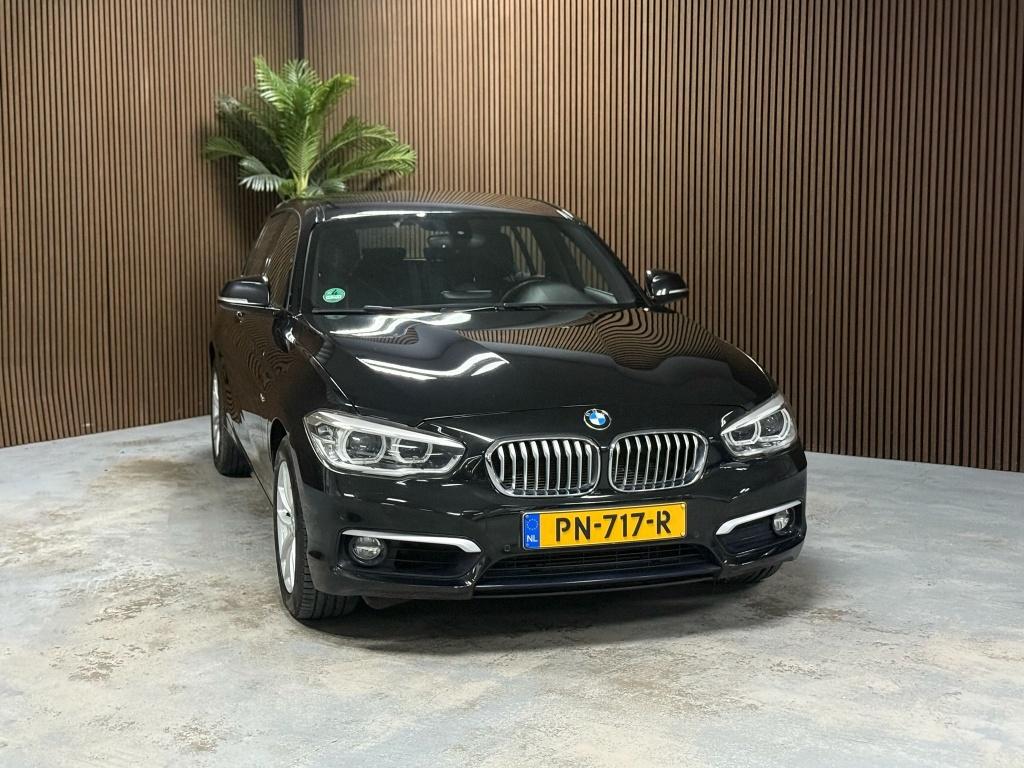 BMW 1-serie 118i Corp. L. Exec. (bj 2017, automaat), Auto's, BMW, Gebruikt, Zwart, Origineel Nederlands, Bedrijf