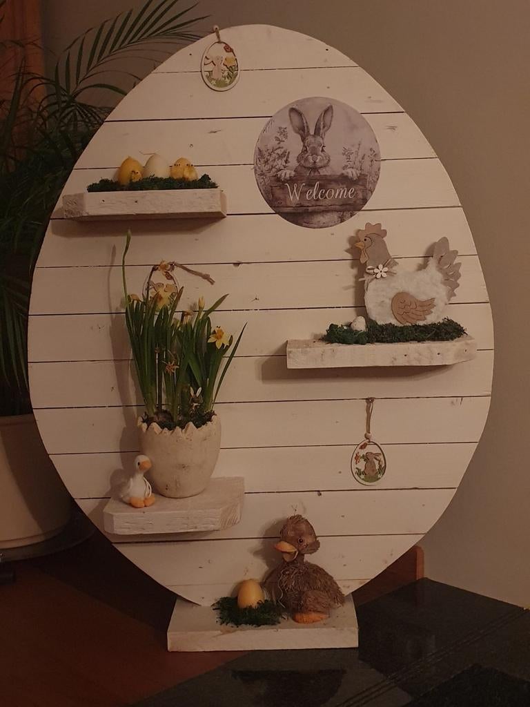 Groot houten paasei, Ophalen