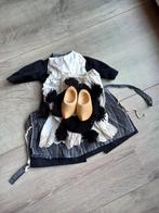 Klederdracht kleertjes voor een pop, Ophalen