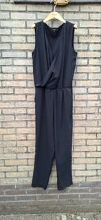 Zwarte jumpsuit Manguun maat 42., Kleding | Dames, Jumpsuits, Ophalen of Verzenden, Zo goed als nieuw, Maat 42/44 (L), Zwart