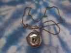 Solid parfume ketting hanger met ketting van Revlon, Ophalen of Verzenden, Gebruikt, Zilver, Overige materialen