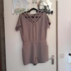 Supertrash beige broek/rok/jumpsuit kort uit 1 stuk maat 40, Kostuum of Pak, Supertrash, Beige, Ophalen of Verzenden