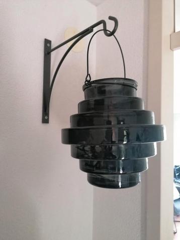 Windlicht voor aan de wand beschikbaar voor biedingen