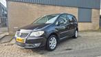 Volkswagen Touran 1.4 TSI 103KW DSG HIGHLINE, Auto's, Euro 6, 4 cilinders, 7 stoelen, Zwart