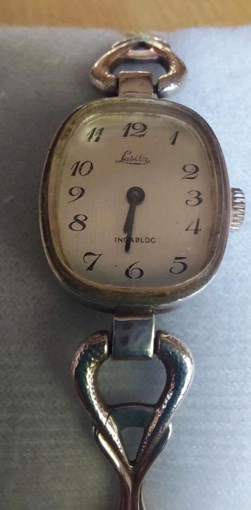 Vintage Zilveren opwind horloge Lasita 18cm 
