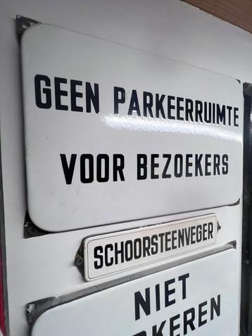 Zwart wit emaille bordje reclame item beschikbaar voor biedingen