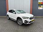 BMW X1 SDrive18i High Executive|Panoramadak|Leer|Head-up|Vol, Wit, Bedrijf, 19 km/l, 3 cilinders