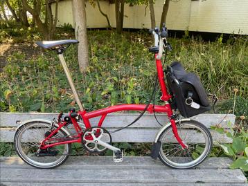Rode Brompton vouwfiets M6L met extra accessoires beschikbaar voor biedingen