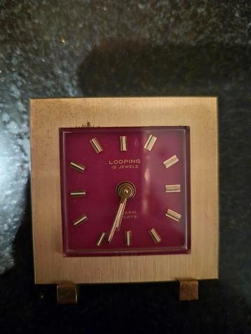 Looping Swiss made tafelklokje beschikbaar voor biedingen