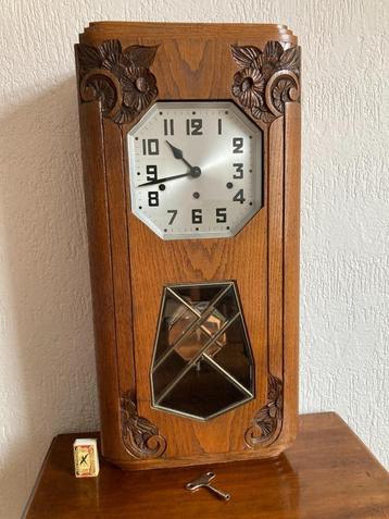 Kienzle hout houten kastklok wandklok muurklok glas slinger beschikbaar voor biedingen