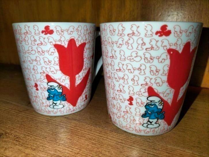Twee mokken, smurf met tulp, nieuw, €9,50 p.stk,samen €17,50, Verzamelen, Smurfen, Zo goed als nieuw, Gebruiksvoorwerp, Ophalen of Verzenden