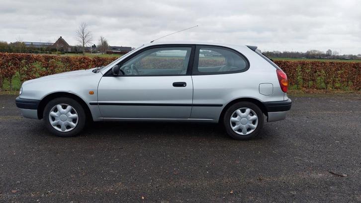 Toyota Corolla 1.3 HB 1998 Grijs, Auto's, Toyota, Particulier, Corolla, Airbags, Centrale vergrendeling, Elektrische ramen, Radio