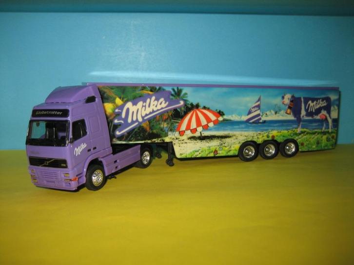 Milka met Koe  VOLVO  FH12   Herpa/Albedo, Hobby en Vrije tijd, Modelauto's | 1:87, Zo goed als nieuw, Bus of Vrachtwagen, Herpa