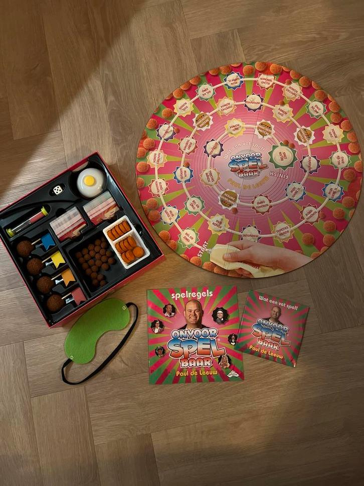 Paul de Leeuw - Onvoorspelbaar Bordspel, Hobby en Vrije tijd, Gezelschapsspellen | Bordspellen, Zo goed als nieuw, Drie of vier spelers